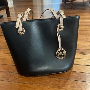 Black & tan with gold hardware Michael Kors tote.